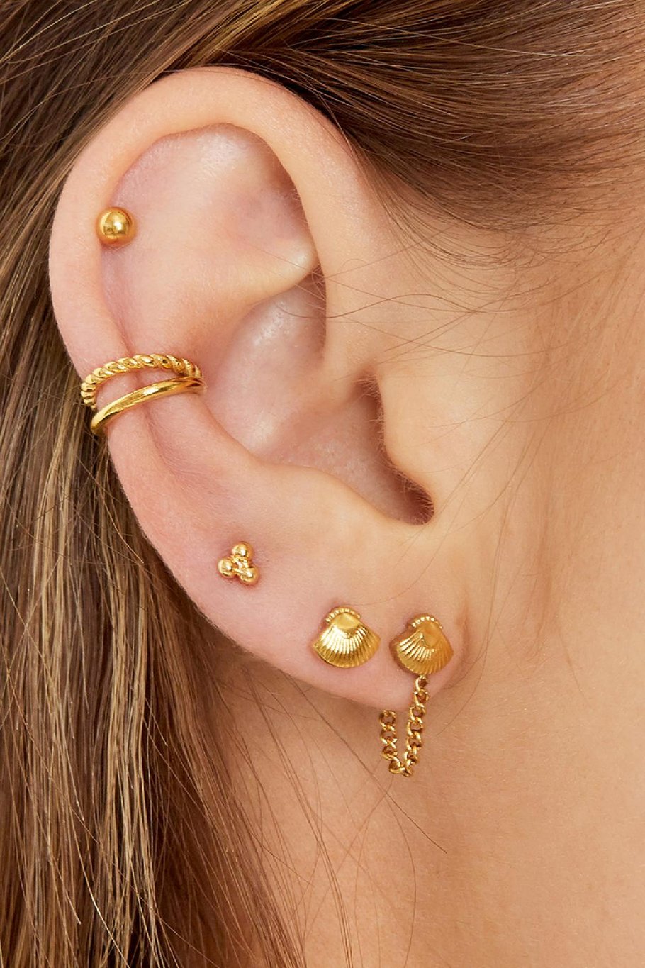 Ear Cuff klein bestehend aus Doppelringen. Ein glatter glänzender und ein gederehter Ring.