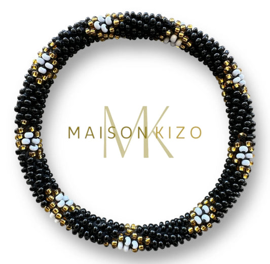 Fair Trade hergestelltes Glasperlen Armband mit Miyuki Perlen. Handgearbeitet in den Farben Schwarz, Weiß und Gold!