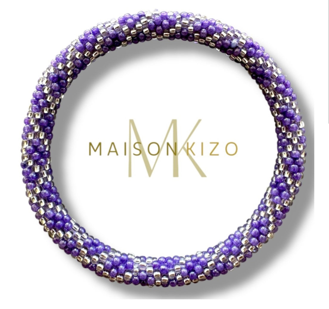 Fair Trade hergestelltes Glasperlen Armband mit Miyuki Perlen. Handgearbeitet in den Farben lila und Silber!