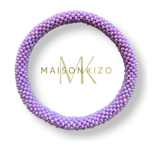 Fair Trade hergestelltes Glasperlen Armband mit Miyuki Perlen. Handgearbeitet in flieder Farben!