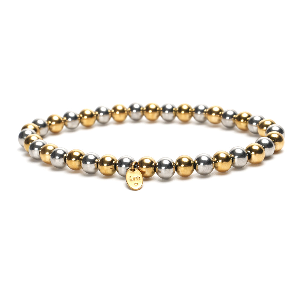 Edelstahl Kugel Armband mit silbernen und goldenen Kügelchen im Wechsel rund um. Dehnbar!