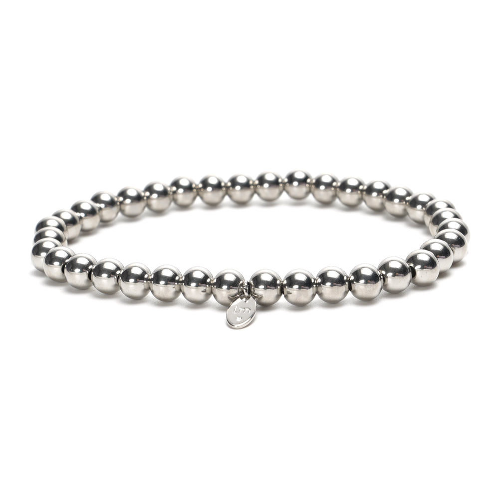 Edelstahl Kugel Armband mit silbernen Kügelchen rund um. Dehnbar!