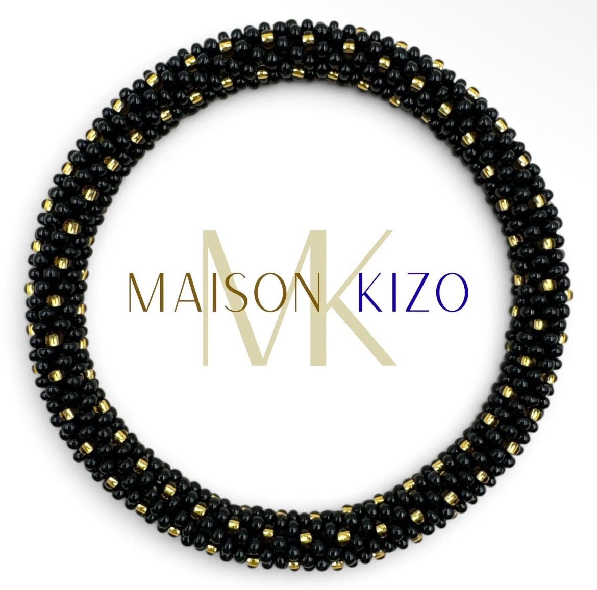 Glasperlen Armband in schwarz mit goldenen Tupfen.